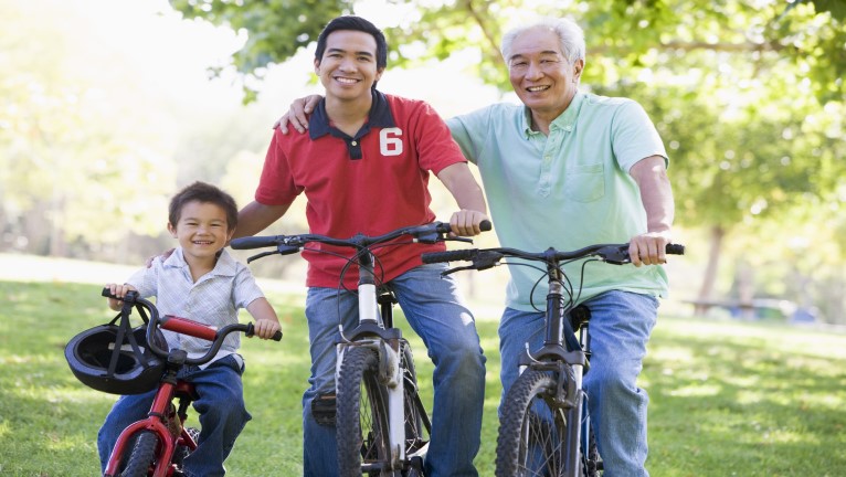 A family of three on their bicycles