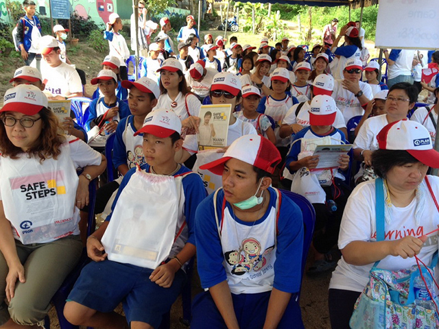 A photo of a group of volunteers and students