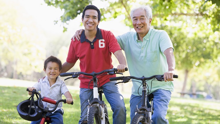 A family of three on their bicycles